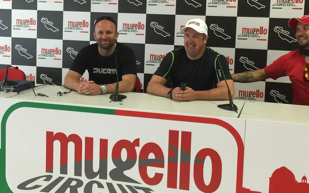 three men sitting at a table - July 4th 2016 Ducati Select 16 Winners sitting at table