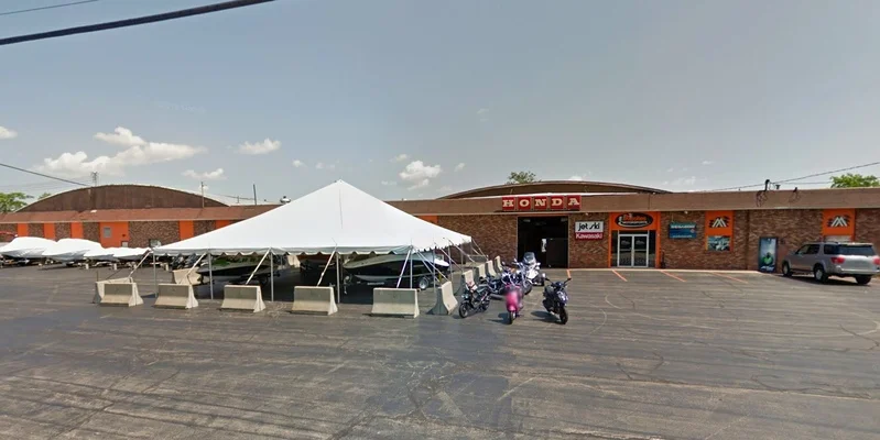 former Mosites Motorsports location with big white tent in parking lot